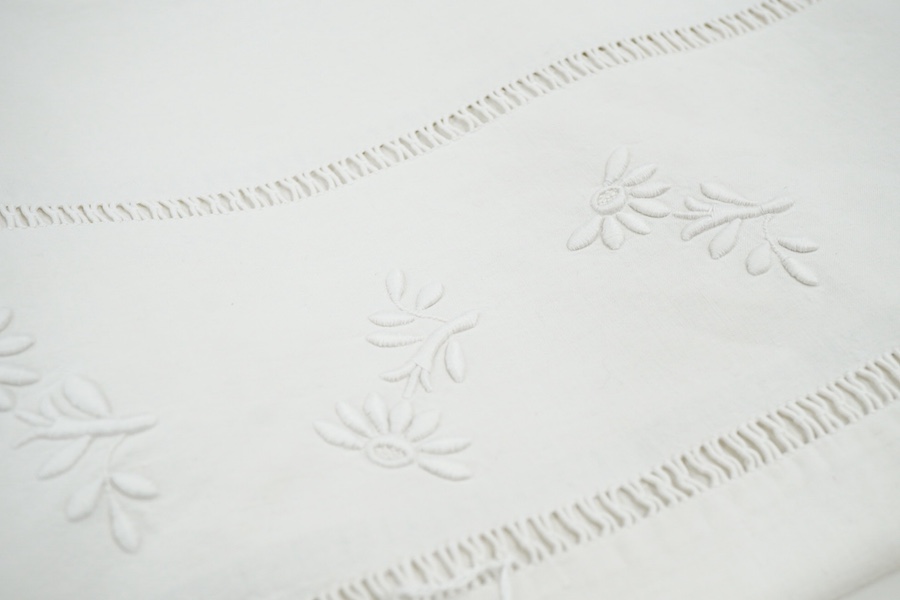 Three 1900's French provincial linen top sheets, all with monograms and embroidery with drawn thread work on the fold backs. Condition - linen strong but all need re laundering.